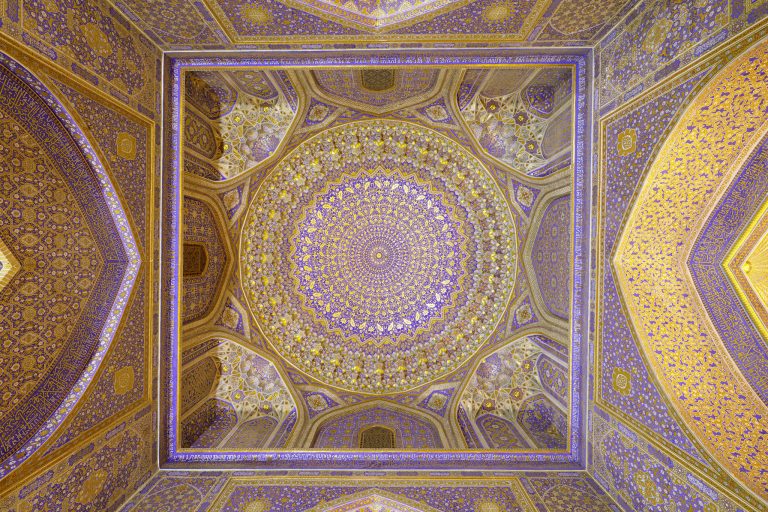 The elaborate ceiling of Tillya-Kori Madrasah in Samarkand, Uzbekistan