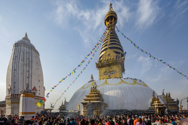 People celebrating the Nepalese New Year at the Swayambhunath or Monkey Temple west of Kathmandu city in Nepal.