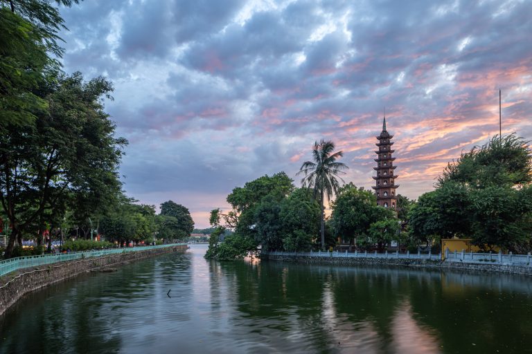 Tran Quoc pagoda at sunset on West Lake, Hanoi, Vietnam.