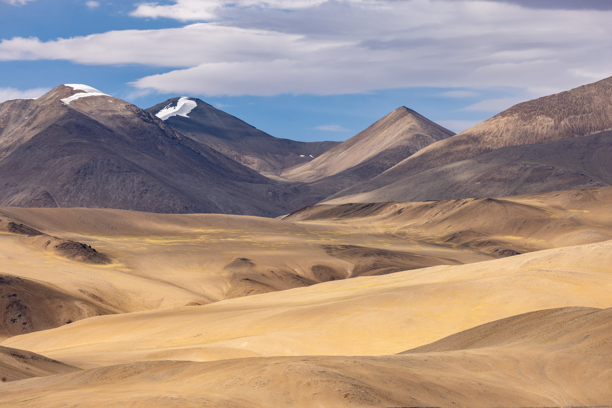 The high mountains surrounding Tsomoiri Lake in Ladakh, India.