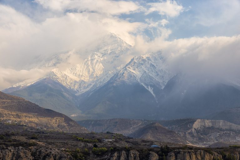 The Nilgiri Himal mountain range at dawn from Jomsom. Part of the Annapurna massif, Nilgiri Himal is composed of three peaks with the highest standing at 7061m.