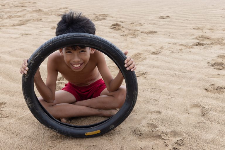 A young boy from the Cham tribe in south-central Vietnam. The Cham or Champa people are a minority ethnic group of people found in southeast Asia. They are part of the Austronesian group of people and are considered to be the original inhabitants of central Vietnam and the coastal areas of Cambodia.